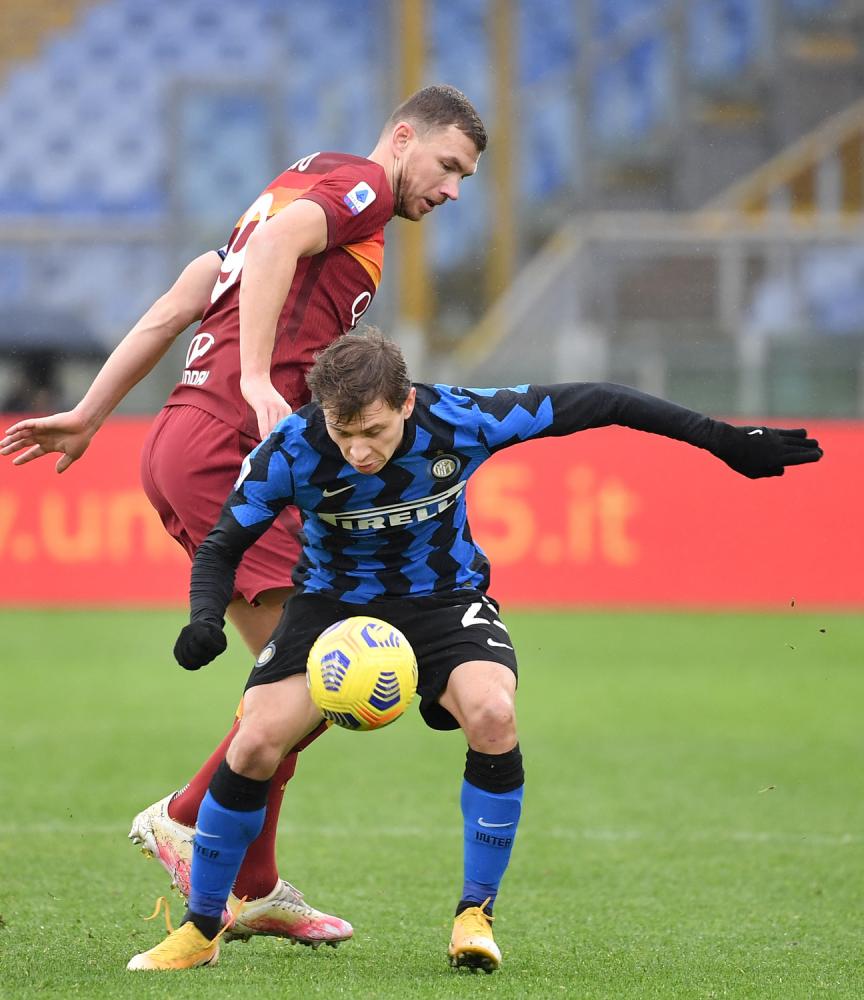 Roma 10/01/2021 - campionato di calcio serie A / Roma-Inter / foto Insidefoto/Image Sport
nella foto: Niccolo' Barella-Edin Dzeko