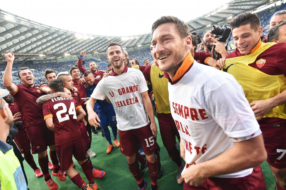 Roma 25/05/2015 - campionato di calcio serie A / Lazio-Roma / 
nella foto: Miralem Pjanic-Francesco Totti