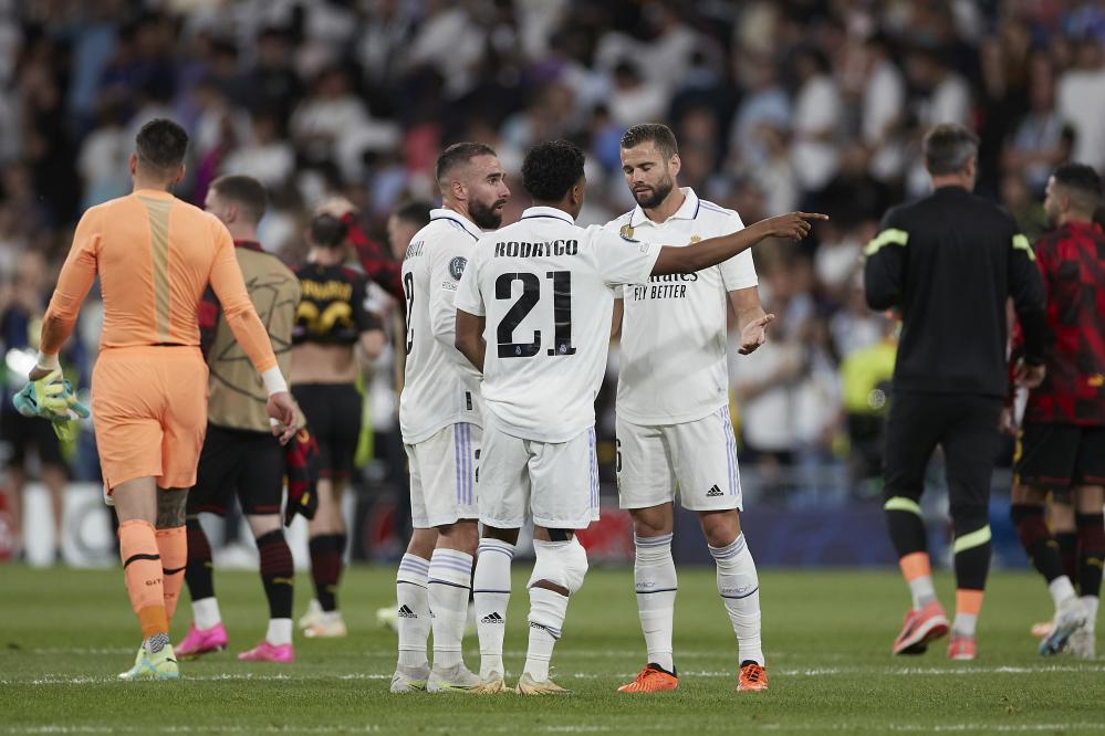 Madrid, Champions League 2022-2023, Real Madrid CF-Manchester City FC, giocata allo stadio Santiago Bernabeu. Nella foto: Rodrygo Goes, Daniel Carvajal e Nacho Fernandez