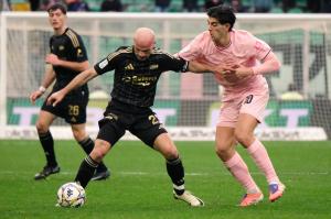 Palermo, Italy, 14 February 2026. Renzo Barbera Stadium, Palermo vs Virtus Entella, match valid for the 2025/2026 Serie B championship. In the photo: Filippo Ranocchia (Palermo FC) and Luca Parodi (Virtus Entella)
