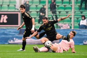 Palermo, Italy, 14 February 2026. Renzo Barbera Stadium, Palermo vs Virtus Entella, match valid for the 2025/2026 Serie B championship. In the photo: Jacopo Segre (Palermo FC) and Luigi Cuppone (Virtus Entella)