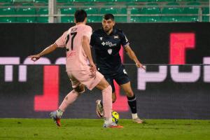 Palermo, Italy, 12 December 2025. Renzo Barbera Stadium, Palermo vs Sampdoria, match valid for the 2025/2026 Serie B championship. In the photo: Nikolas Ioannou (Sampdoria) and Niccolo' Pierozzi (Palermo FC)