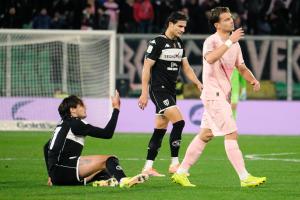 Palermo, Italy, 18 January 2026. Renzo Barbera Stadium, Palermo vs Spezia, match valid for the 2025/2026 Serie B championship. In the photo: Edoardo Soleri (Spezia) and Jacopo Segre (Palermo FC) and Ales Mateju (Spezia)