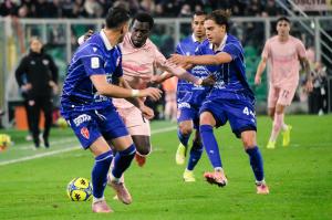 Palermo, Italy, 27 December 2025. Renzo Barbera Stadium, Palermo vs Padova, match valid for the 2025/2026 Serie B championship. In the photo: Claudio Gomes (Palermo FC) and Jonas Harder (Padova)