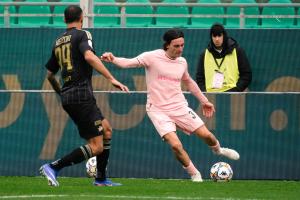 Palermo, Italy, 14 February 2026. Renzo Barbera Stadium, Palermo vs Virtus Entella, match valid for the 2025/2026 Serie B championship. In the photo: Tommaso Augello (Palermo FC) and Francesco Mezzoni (Virtus Entella)