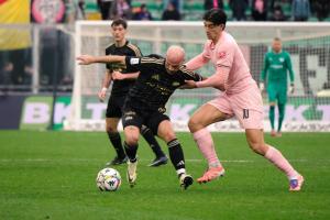 Palermo, Italy, 14 February 2026. Renzo Barbera Stadium, Palermo vs Virtus Entella, match valid for the 2025/2026 Serie B championship. In the photo: Filippo Ranocchia (Palermo FC) and Luca Parodi (Virtus Entella)